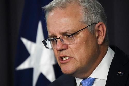 Thủ tướng Úc Scott Morrison yêu cầu Trung Quốc xin lỗi vì đăng ảnh giả mạo. Ảnh: EPA-EFE