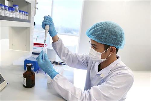 Nghiên cứu sản xuất vắc-xin ngừa COVID-19 tại Công ty Cổ phần Công nghệ sinh học dược Nanogen. Ảnh: H.G